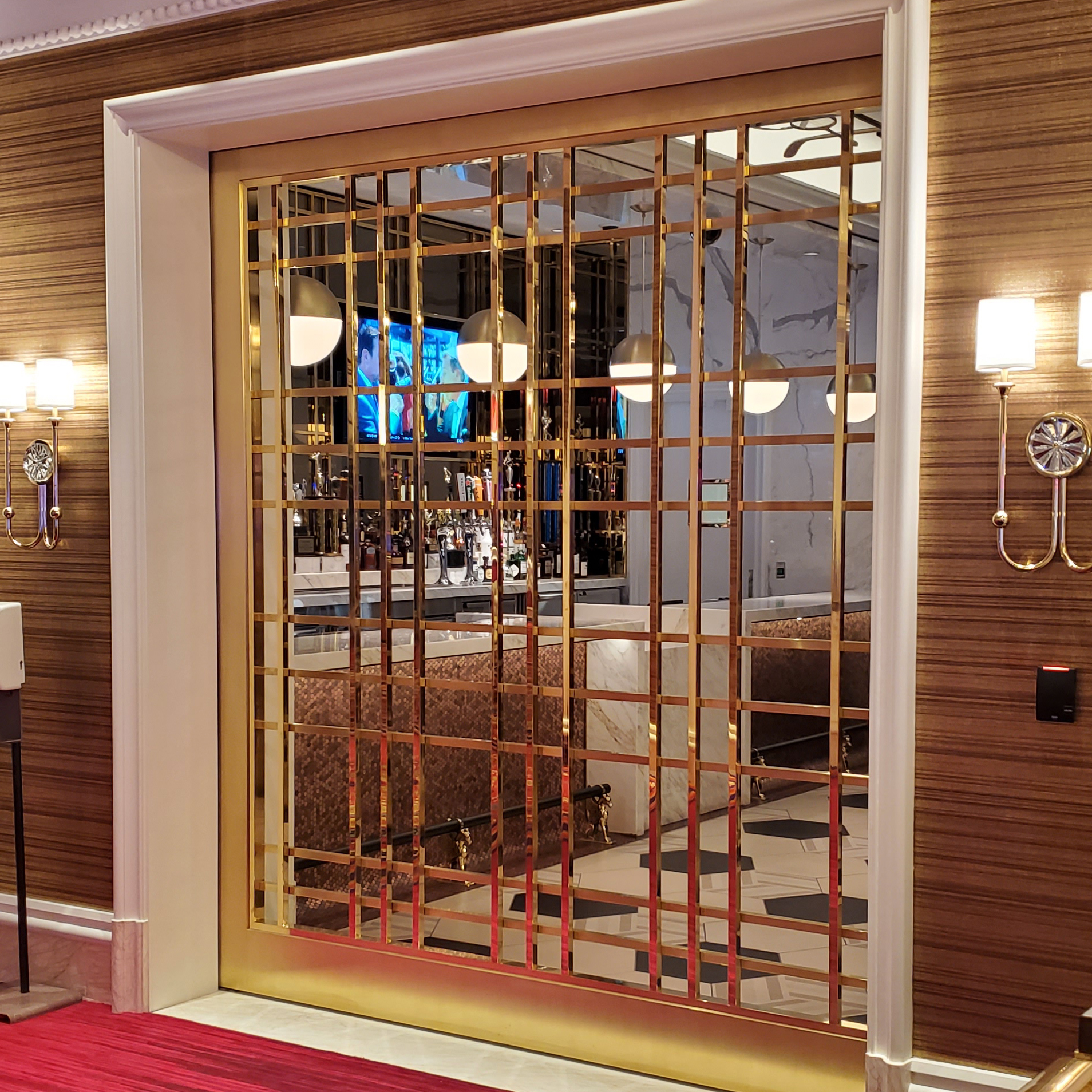 Brass casino doors, double hung brass doors, custom brass doors