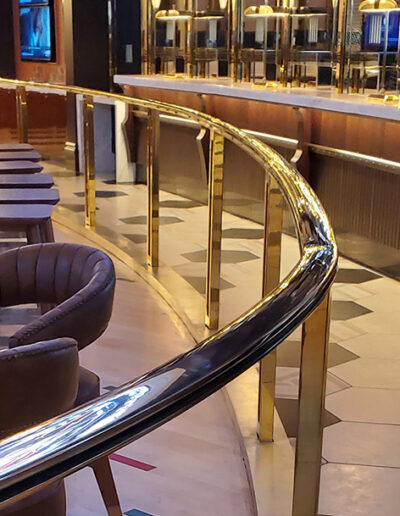 custom brass railing, custom brass teller windows, brass fabrication, polished brass railing